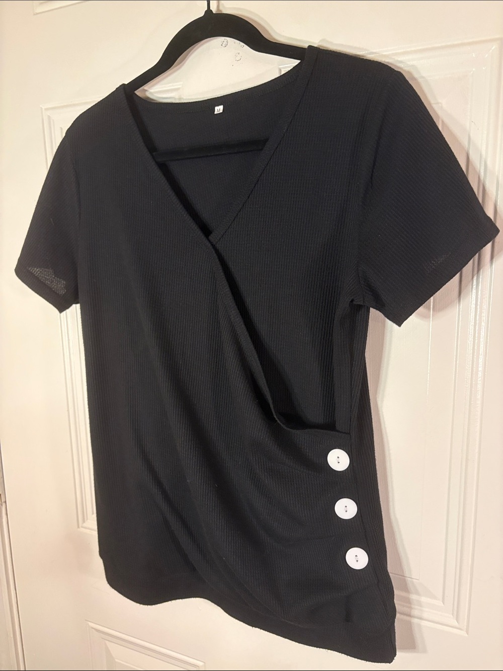 Classic Black Short-Sleeve Wrap Top with Accent Buttons